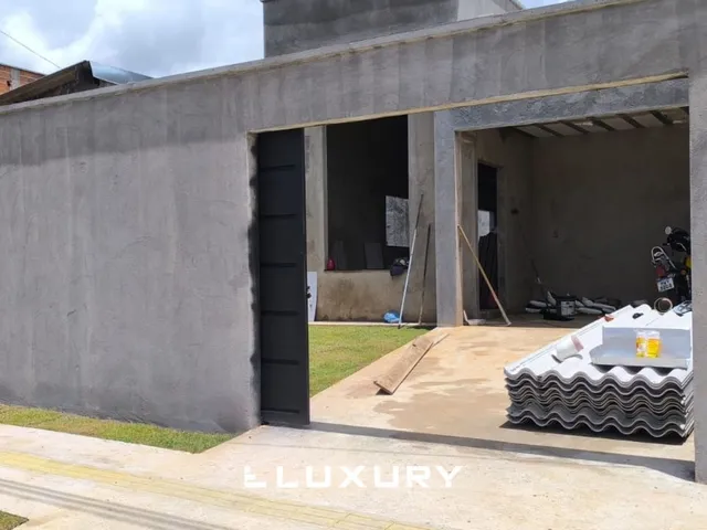Imagem 6: Casa moderna no Santa Edwiges com pé direito alto e área gourmet