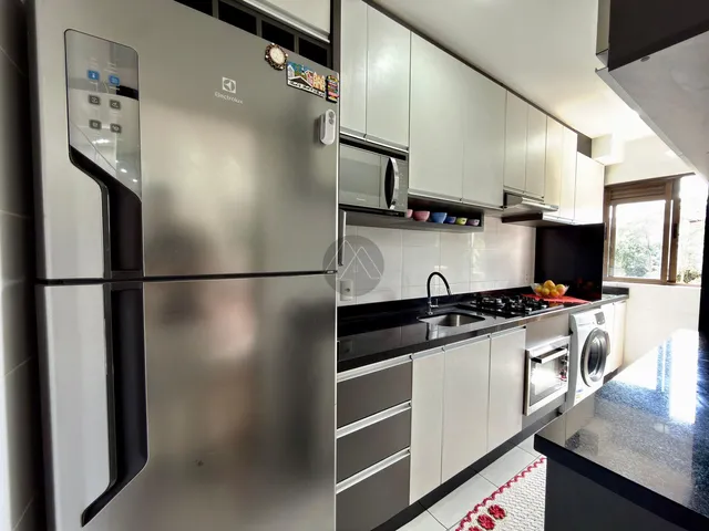 Imagem 15: Apartamento com Móveis Planejados e Sacada com Churrasqueira no Colônia Rio Grande