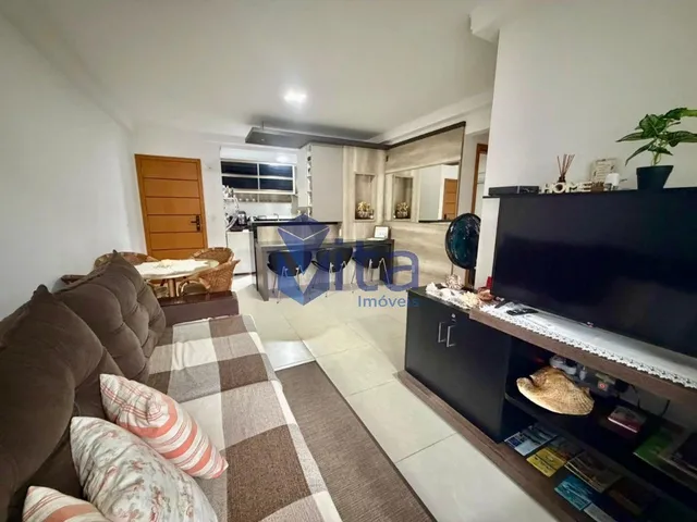 Imagem: O apartamento possui 2 Dormitórios, 1 Suíte, 2 Banheiros,