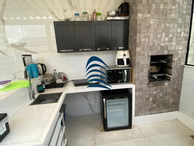 Imagem 2: Uma cobertura ampla e completa, ideal para quem busca espaço, conforto, privacidade e