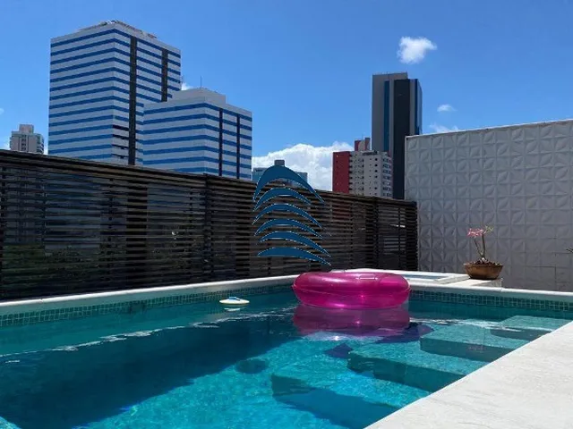 Imagem 12: Uma cobertura ampla e completa, ideal para quem busca espaço, conforto, privacidade e
