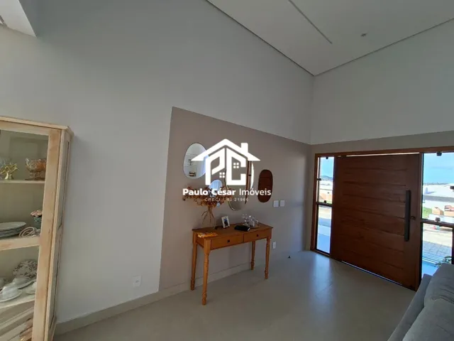 Imagem 2: Excelente casa em condomínio com 03 quartos, sendo 01 suíte com closet, ótima sala de