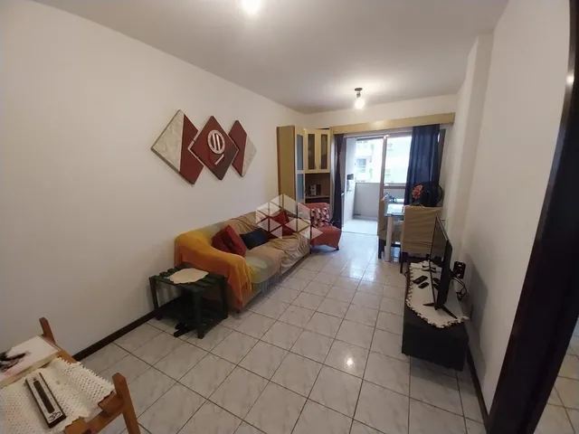 Imagem: O apartamento possui 2 Dormitórios, 1 Suíte, 2 Banheiros,