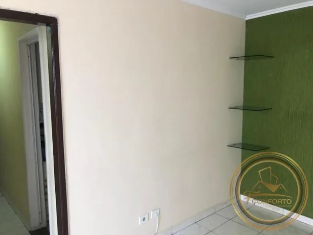 Imagem 14: Apartamento para locação na Mooca com sala ampla para 2 ambientes, cozinha com entrada