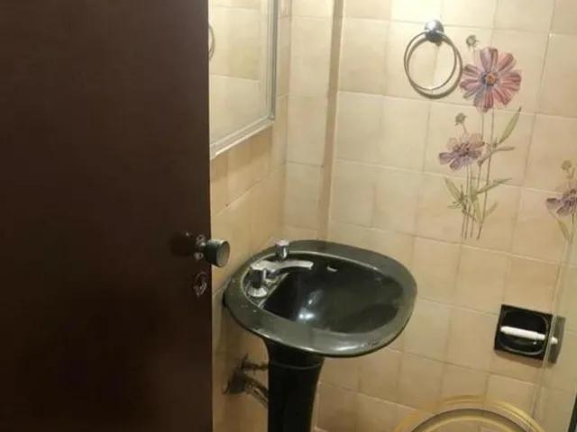 Imagem 3: Apartamento para locação na Mooca com sala ampla para 2 ambientes, cozinha com entrada