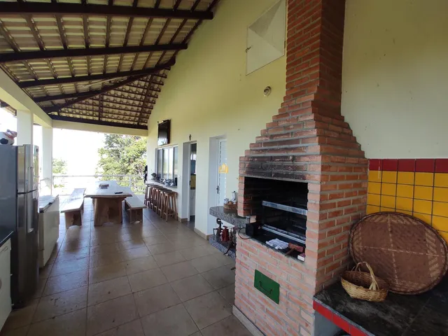 Imagem 11: Casa de Alto Padrão no Condomínio Belvedere, Esmeraldas - 4 Quartos, Piscina, 5 Vagas de Garagem - Luxo e Conforto!