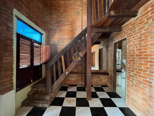Imagem 3: Casa 2 Quartos no Coophema | Madeira, Pedra e Área de Lazer