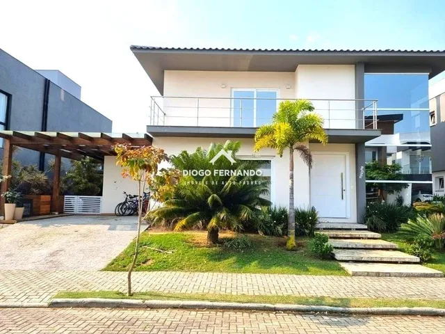 Imagem: A casa possui 3 Dormitórios, 3 Suítes, 4 Banheiros, 4