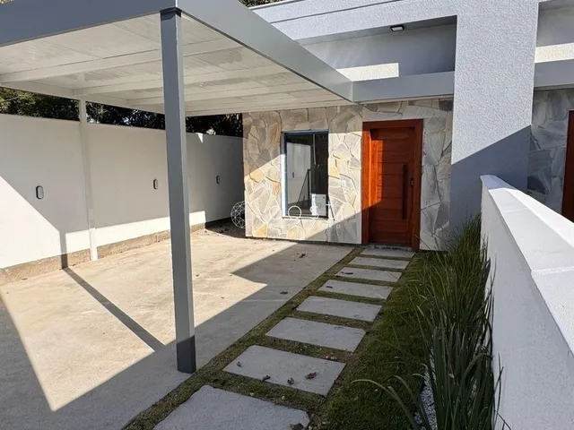 Imagem: A casa possui 2 Dormitórios, 2 Banheiros, 1 Vaga na