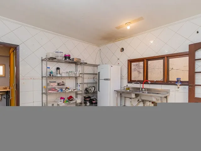 Imagem 12: Imperdível Casa de 3 Quartos com Suíte e Garagem em Santo Amaro, São Paulo-Sp! Aproveite!