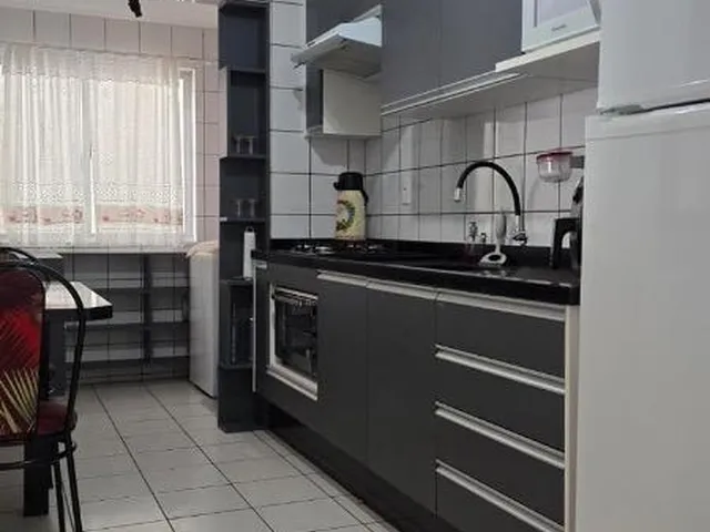 Imagem 10: Apartamento 2 Dormitorios Suite Sacada com Churrasqueira - Vaga Privativa Balneario Camboriu