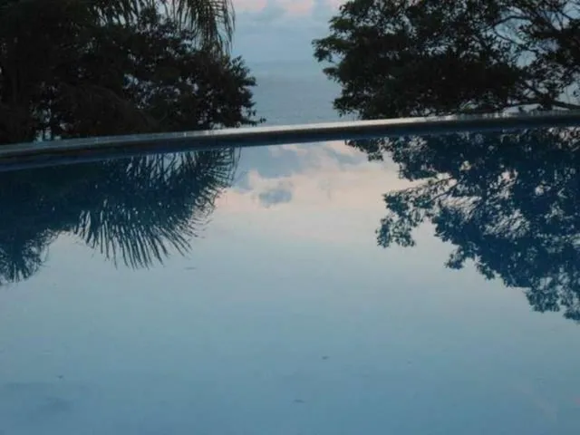 Imagem 6: Aluguel de Temporada em Garopaba Belíssima Casa em Meio À Mata, Piscina, Churrasqueira com Visual 360º Mar