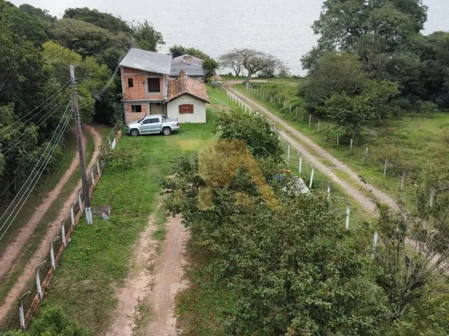 Imagem 4: Lindo Terreno de 1050M² com 3 Casas, Acesso para Lagoa