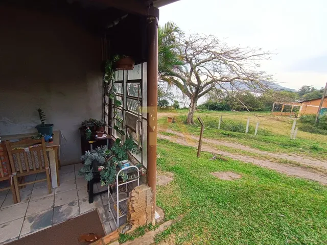 Imagem 3: Lindo Terreno de 1050M² com 3 Casas, Acesso para Lagoa