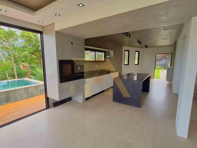 Imagem 4: Casa Nova com Piscina de Borda Infinita e 2 Suítes