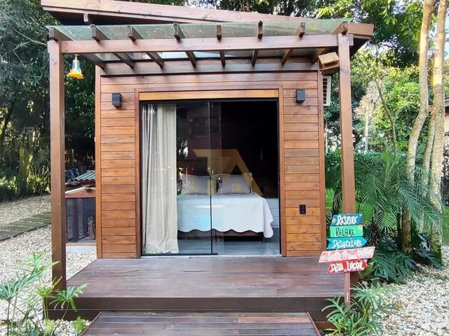Imagem 11: Imperdível Casa de Luxo em Ibiraquera: 4 Quartos, 3 Suítes, 5 Banheiros, 4 Vagas Garagem, 360M² - Imbituba-Sc