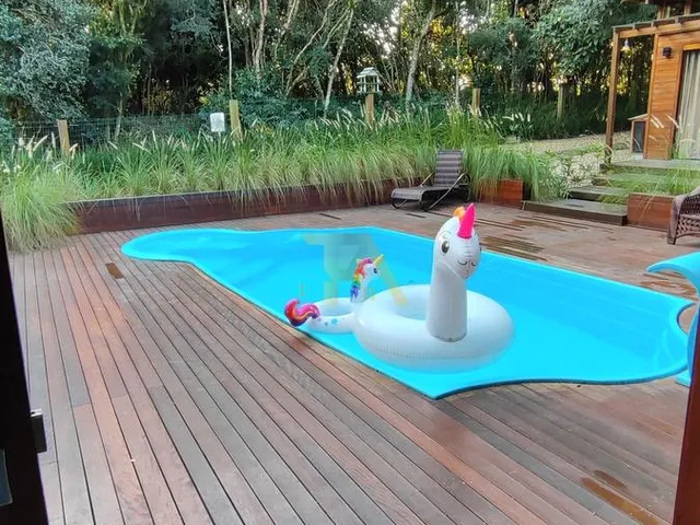 Imagem 3: Imperdível Casa de Luxo em Ibiraquera: 4 Quartos, 3 Suítes, 5 Banheiros, 4 Vagas Garagem, 360M² - Imbituba-Sc