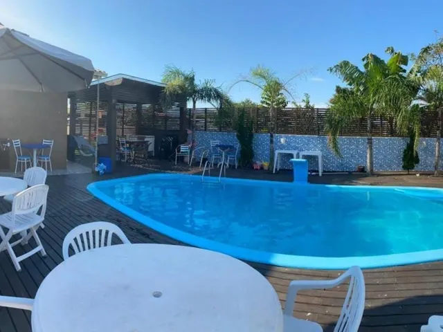 Imagem 5: Casa À Venda em Garopaba-Sc: 3 Quartos, 1 Suíte, 2 Salas, 2 Banheiros, 3 Vagas. Encante-Se com Conforto e Sofisticação!