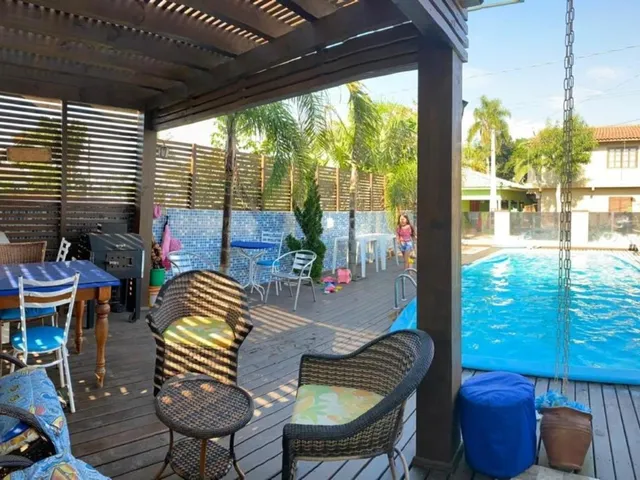 Imagem 8: Casa À Venda em Garopaba-Sc: 3 Quartos, 1 Suíte, 2 Salas, 2 Banheiros, 3 Vagas. Encante-Se com Conforto e Sofisticação!
