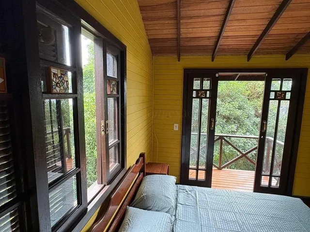 Imagem 11: Casa Exclusiva Inspirada em Bali À Beira da Lagoa 3 Suítes, Hidromassagem e Chalé Mobiliado