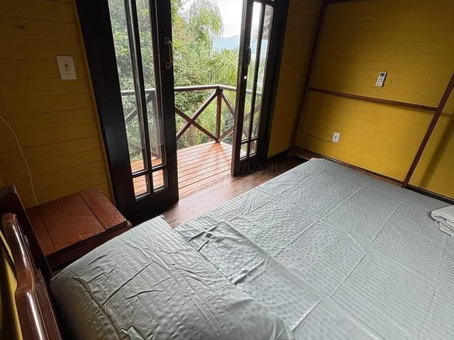 Imagem 9: Casa Exclusiva Inspirada em Bali À Beira da Lagoa 3 Suítes, Hidromassagem e Chalé Mobiliado