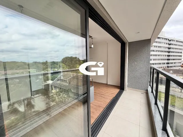 Imagem 10: Studio com Móveis Planejados e Sacada com Vista para o Jardim Botânico - Curitiba
