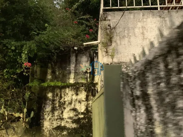 Imagem 8: Terreno de Esquina com Casa de 400M², Ideal para Edifício